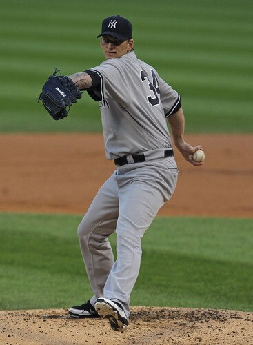 CHICAGO, IL - AUGUST 03:  Starting pitcher A.J. Burnett #34 of the New York Yankees delivers the ball against the Chicago White Sox at U.S. Cellular Field on August 3, 2011 in Chicago, Illinois.  <br /><br /><span class="help">(Photo by Jonathan Daniel/Getty Images)</span>