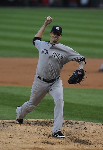 CHICAGO, IL - AUGUST 03: Starting pitcher A.J. Burnett #34 of the New York Yankees delivers the ball against the Chicago White Sox at U.S. Cellular Field on August 3, 2011 in Chicago, Illinois. <br /><br /><span class="help">(Photo by Jonathan Daniel/Getty Images)</span>