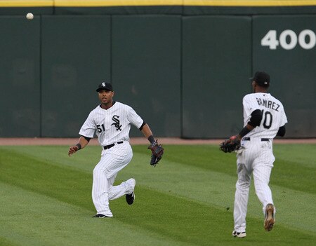 CHICAGO, IL - AUGUST 03: Alex Rios #51 of the Chicago White Sox misplays a fly ball in center field as teammate Alexei Ramirez #10 runs out against the New York Yankees at U.S. Cellular Field on August 3, 2011 in Chicago, Illinois. <br /><br /><span class="help">(Photo by Jonathan Daniel/Getty Images)</span>