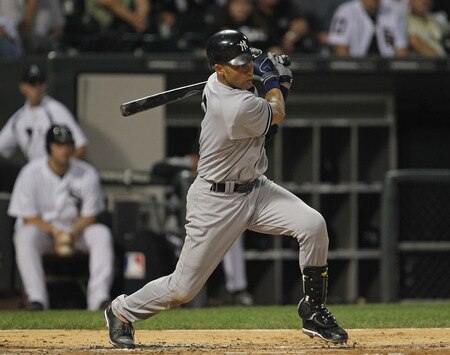 CHICAGO, IL - AUGUST 03:  Derek Jeter #2 of the New York Yankees hits a run-scoring single in the 3rd inning against the Chicago White Sox at U.S. Cellular Field on August 3, 2011 in Chicago, Illinois.  <br /><br /><span class="help">(Photo by Jonathan Daniel/Getty Images)</span>
