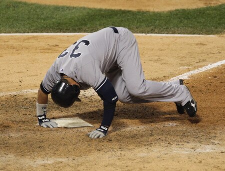 CHICAGO, IL - AUGUST 03: Nick Swisher #33 of the New York Yankees hits the ground after fouling off a pitch against the Chicago White Sox at U.S. Cellular Field on August 3, 2011 in Chicago, Illinois. <br /><br /><span class="help">(Photo by Jonathan Daniel/Getty Images)</span>