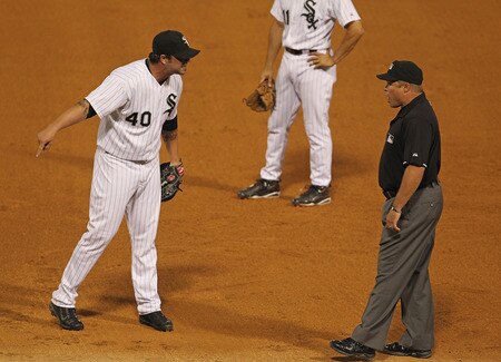 CHICAGO, IL - AUGUST 03: Brian Bruney #40 of the Chicago White Sox argues a call with first base umpire Marvin Hudson #51 after being thrown out of a game against the New York Yankees at U.S. Cellular Field on August 3, 2011 in Chicago, Illinois. The Yankees defeated the White Sox 18-7. <br /><br /><span class="help">(Photo by Jonathan Daniel/Getty Images)</span>
