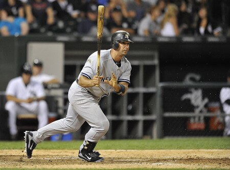 CHICAGO, IL - AUGUST 04:  Jorge Posada #20 of the New York Yankees follows through on an RBI single scoring teammate Robinson Cano #24 during the seventh inning against the Chicago White Sox at U.S. Cellular Field on August 4, 2011 in Chicago, Illinois.  <br /><br /><span class="help">(Photo by Brian Kersey/Getty Images)</span>