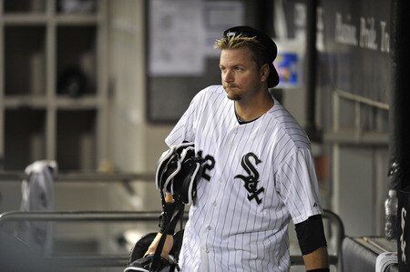 CHICAGO, IL - AUGUST 04:  Catcher A. J. Pierzynski #12 of the Chicago White Sox gathers his gear after losing to the New York Yankees 7-2 at U.S. Cellular Field on August 4, 2011 in Chicago, Illinois.  <br /><br /><span class="help">(Photo by Brian Kersey/Getty Images)</span>