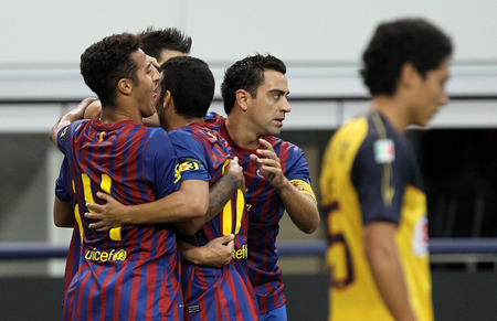 ARLINGTON, TX - AUGUST 06: FC Barcelona celebrates a goal by David Villa #7 against Club America at Cowboys Stadium on August 6, 2011 in Arlington, Texas. <br /><br /><span class="help">(Photo by Ronald Martinez/Getty Images)</span>
