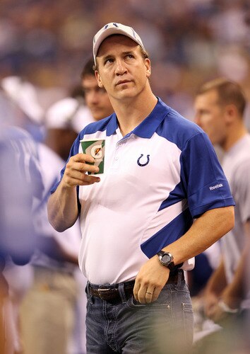 INDIANAPOLIS, IN - AUGUST 19:  Peyton Manning of the Indianapolis Colts watches the action during the game against the Washington Redskins at Lucas Oil Stadium on August 19, 2011 in Indianapolis, Indiana.  <br /><br /><span class="help">(Photo by Andy Lyons/Getty Images)</span>