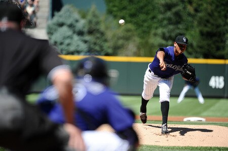 DENVER, CO - AUGUST 20:  Esmil Rogers #48 of the Colorado Rockies pitches during the game against the Los Angeles Dodgers at Coors Field on August 20, 2011 in Denver, Colorado.  <br /><br /><span class="help">(Photo by Garrett W. Ellwood/Getty Images)</span>