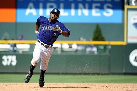DENVER, CO - AUGUST 20:  Eric Young, Jr. #1 of the Colorado Rockies runs to third base after hitting a triple during the game against the Los Angeles Dodgers at Coors Field on August 20, 2011 in Denver, Colorado.  <br /><br /><span class="help">(Photo by Garrett W. Ellwood/Getty Images)</span>