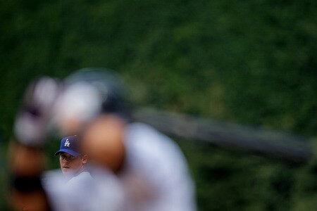 DENVER, CO - AUGUST 21:  Starting pitcher Chad Billingsley #58 of the Los Angeles Dodgers is framed by Carlos Gonzalez #5 of the Colorado Rockies during the first inning at Coors Field on August 21, 2011 in Denver, Colorado.  <br /><br /><span class="help">(Photo by Justin Edmonds/Getty Images)</span>