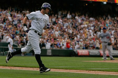 DENVER, CO - AUGUST 21:  Seth Smith #7 of the Colorado Rockies trots around the bases after hitting a two run go-ahead home run against Chad Billingsley #58 of the Los Angeles Dodgers during the seventh inning at Coors Field on August 21, 2011 in Denver, Colorado.  The Rockies defeated the Dodgers 5-3. <br /><br /><span class="help">(Photo by Justin Edmonds/Getty Images)</span>