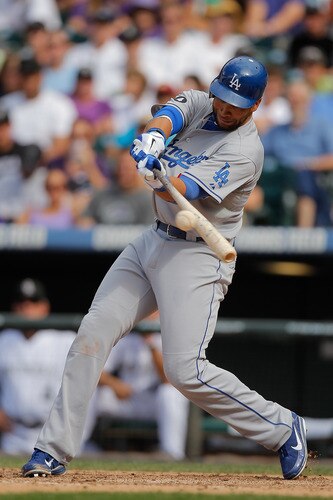 DENVER, CO - AUGUST 21:  James Loney #7 of the Los Angeles Dodgers singles to left field during the ninth inning against the Colorado Rockies at Coors Field on August 21, 2011 in Denver, Colorado.  <br /><br /><span class="help">(Photo by Justin Edmonds/Getty Images)</span>