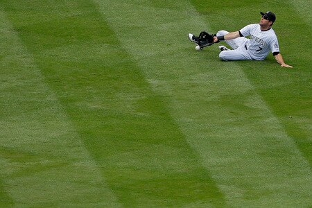 DENVER, CO - AUGUST 21:  Seth Smith #7 of the Colorado Rockies comes up short on a ball off the bat of Matt Kemp #27 of the Los Angeles Dodgers, allowing a run to score to tie the game in the third inning at Coors Field on August 21, 2011 in Denver, Colorado.  <br /><br /><span class="help">(Photo by Justin Edmonds/Getty Images)</span>