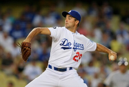 LOS ANGELES, CA - AUGUST 26:  Ted Lilly #29 of the Los Angeles Dodgers pitches in the first inning against the Colorado Rockies during the MLB game at Dodger Stadium on August 26, 2011 in Los Angeles, California.  <br /><br /><span class="help">(Photo by Victor Decolongon/Getty Images)</span>