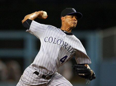 LOS ANGELES, CA - AUGUST 26:  Esmil Rogers #48 of the Colorado Rockies pitches in the second inning during the MLB game against the Los Angeles Dodgers at Dodger Stadium on August 26, 2011 in Los Angeles, California.  <br /><br /><span class="help">(Photo by Victor Decolongon/Getty Images)</span>