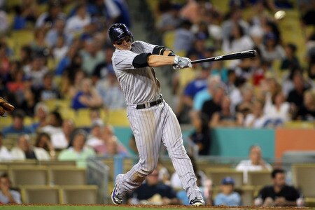 LOS ANGELES, CA - AUGUST 26:  Troy Tulowitzki #2 of the Colorado Rockies hits a double to right field in the fourth inning against the Los Angeles Dodgers during the MLB game at Dodger Stadium on August 26, 2011 in Los Angeles, California.  <br /><br /><span class="help">(Photo by Victor Decolongon/Getty Images)</span>