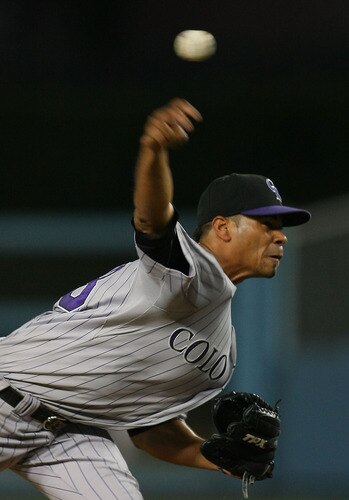 LOS ANGELES, CA - AUGUST 26:  Esmil Rogers #48 of the Colorado Rockies pitches in the second inning during the MLB game against the Los Angeles Dodgers at Dodger Stadium on August 26, 2011 in Los Angeles, California.  <br /><br /><span class="help">(Photo by Victor Decolongon/Getty Images)</span>