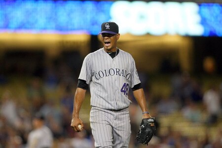LOS ANGELES, CA - AUGUST 26:  Pitcher Esmil Rogers #48 of the Colorado Rockies reacts after being called for a balk which scored Tony Gwynn Jr. of the Los Angeles Dodgers in the seventh inning to tie the game at 1-1 during the MLB game at Dodger Stadium on August 26, 2011 in Los Angeles, California.  <br /><br /><span class="help">(Photo by Victor Decolongon/Getty Images)</span>