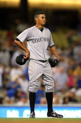 LOS ANGELES, CA - AUGUST 26:  Pitcher Esmil Rogers #48 of the Colorado Rockies looks on after being called for a balk in the seventh inning which scored Tony Gwynn Jr. of the Los Angeles Dodgers to tie the game at 1-1 during the MLB game at Dodger Stadium on August 26, 2011 in Los Angeles, California.  <br /><br /><span class="help">(Photo by Victor Decolongon/Getty Images)</span>