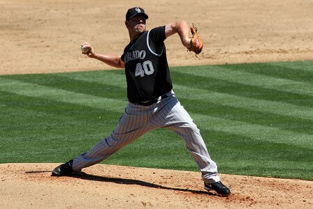 LOS ANGELES, CA - AUGUST 27:  Kevin Millwood #40 of the Colorado Rockies pitches against the Los Angeles Dodgers in the second inning of the game at Dodger Stadium on August 27, 2011 in Los Angeles, California.  <br /><br /><span class="help">(Photo by Jeff Golden/Getty Images)</span>
