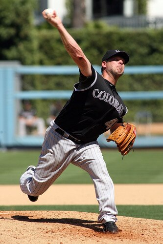 LOS ANGELES, CA - AUGUST 27:  Kevin Millwood #40 of the Colorado Rockies pitches against the Los Angeles Dodgers in the third inning of the game at Dodger Stadium on August 27, 2011 in Los Angeles, California.  <br /><br /><span class="help">(Photo by Jeff Golden/Getty Images)</span>