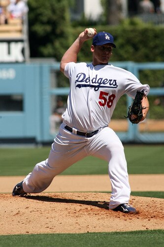 LOS ANGELES, CA - AUGUST 27:  Chad Billingsley #58 of the Los Angeles Dodgers pitches against the Colorado Rockies in the third inning of the game at Dodger Stadium on August 27, 2011 in Los Angeles, California.  <br /><br /><span class="help">(Photo by Jeff Golden/Getty Images)</span>