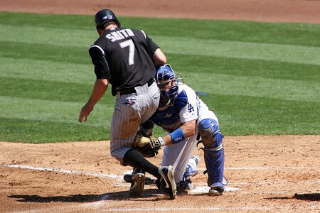 LOS ANGELES, CA - AUGUST 27:  A.J. Ellis #17 of the Los Angeles Dodgers tags out Seth Smith #7 of the Colorado Rockies at home plate in the second inning of the game at Dodger Stadium on August 27, 2011 in Los Angeles, California.  <br /><br /><span class="help">(Photo by Jeff Golden/Getty Images)</span>