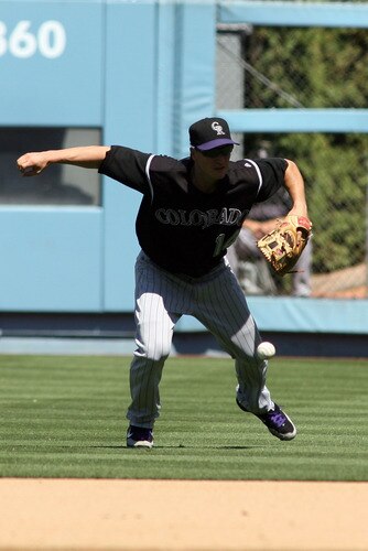 LOS ANGELES, CA - AUGUST 27:  Mark Ellis #14 of the Colorado Rockies drops a pop up by Chad Billingsley #58 of the Los Angeles Dodgers (not pictured) in the third inning of the game at Dodger Stadium on August 27, 2011 in Los Angeles, California.  <br /><br /><span class="help">(Photo by Jeff Golden/Getty Images)</span>