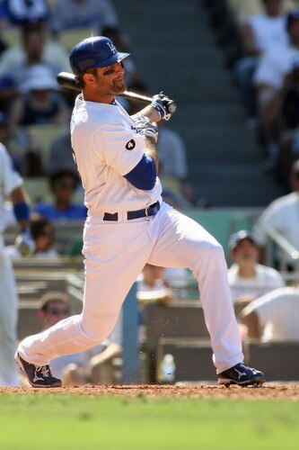 LOS ANGELES, CA - AUGUST 27:  Casey Blake #23 of the Los Angeles Dodgers hits a two RBI double against the Colorado Rockies to tie the game in the sixth inning at Dodger Stadium on August 27, 2011 in Los Angeles, California.  <br /><br /><span class="help">(Photo by Jeff Golden/Getty Images)</span>
