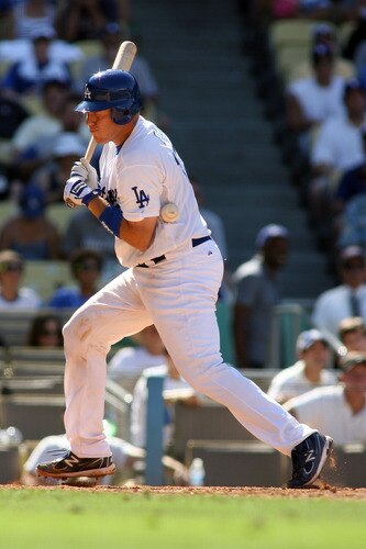 LOS ANGELES, CA - AUGUST 27:  A.J. Ellis #17 of the Los Angeles Dodgers is hit by a fastball pitch against the Colorado Rockies in the sixth inning at Dodger Stadium on August 27, 2011 in Los Angeles, California.  <br /><br /><span class="help">(Photo by Jeff Golden/Getty Images)</span>