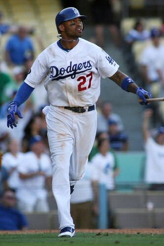 LOS ANGELES, CA - AUGUST 27:  Matt Kemp #27 of the Los Angeles Dodgers watches his game-winning solo home run against the Colorado Rockies in the bottom of the 11th inning at Dodger Stadium on August 27, 2011 in Los Angeles, California.  The Dodgers won 7-6.  <br /><br /><span class="help">(Photo by Jeff Golden/Getty Images)</span>