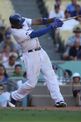 LOS ANGELES, CA - AUGUST 27:  Matt Kemp #27 of the Los Angeles Dodgers hits the game-winning solo home run against the Colorado Rockies in the bottom of the 11th inning at Dodger Stadium on August 27, 2011 in Los Angeles, California. The Dodgers won 7-6.  <br /><br /><span class="help">(Photo by Jeff Golden/Getty Images)</span>