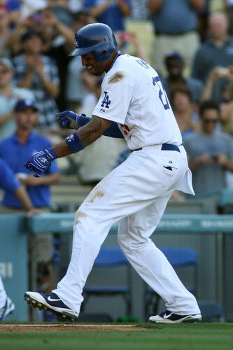 LOS ANGELES, CA - AUGUST 27:  Matt Kemp #27 of the Los Angeles Dodgers celebrates his game-winning solo home run as he touches home plate against the Colorado Rockies in the bottom of the 11th inning at Dodger Stadium on August 27, 2011 in Los Angeles, California.  The Dodgers won 7-6.  <br /><br /><span class="help">(Photo by Jeff Golden/Getty Images)</span>