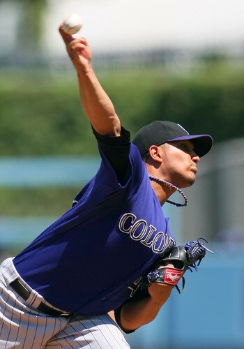 LOS ANGELES, CA - AUGUST 28:  Pitcher Jhoulys Chacin #45 of the Colorado Rockies pitches in the first inning during the MLB game against the Los Angeles Dodgers at Dodger Stadium on August 28, 2011 in Los Angeles, California.  <br /><br /><span class="help">(Photo by Victor Decolongon/Getty Images)</span>