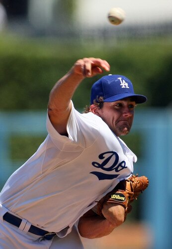 LOS ANGELES, CA - AUGUST 28:  Pitcher Nathan Eovaldi #50 of the Los Angeles Dodgers pitches in the first inning during the MLB game against the Colorado Rockies at Dodger Stadium on August 28, 2011 in Los Angeles, California.  <br /><br /><span class="help">(Photo by Victor Decolongon/Getty Images)</span>