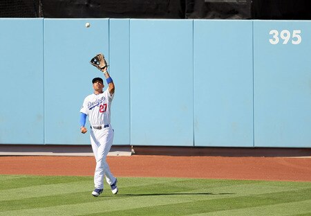LOS ANGELES, CA - AUGUST 28:  Matt Kemp #27 of the Los Angeles Dodgers gets under a flyball in center field in the eighth inning during the MLB game against the Colorado Rockies at Dodger Stadium on August 28, 2011 in Los Angeles, California. The Rockies defeated the Dodgers 7-6. <br /><br /><span class="help">(Photo by Victor Decolongon/Getty Images)</span>