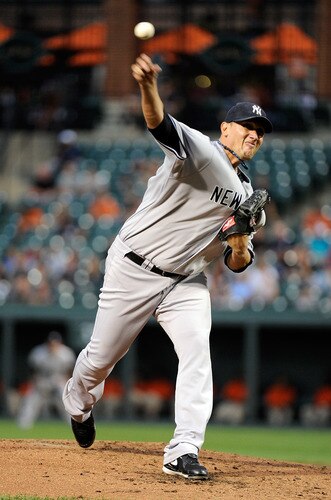 BALTIMORE, MD - AUGUST 29:  Freddy Garcia #36 of the New York Yankees pitches against the Baltimore Orioles at Oriole Park at Camden Yards on August 29, 2011 in Baltimore, Maryland.  <br /><br /><span class="help">(Photo by Greg Fiume/Getty Images)</span>