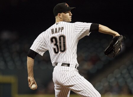HOUSTON - AUGUST 31:  Pitcher J.A. Happ #30 of the Houston Astros throws against the Pittsburgh Pirates in the first inning at Minute Maid Park on August 31, 2011 in Houston, Texas.  <br /><br /><span class="help">(Photo by Bob Levey/Getty Images)</span>