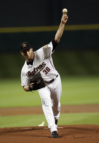 HOUSTON - AUGUST 31:  Pitcher J.A. Happ #30 of the Houston Astros throws against the Pittsburgh Pirates in the first inning at Minute Maid Park on August 31, 2011 in Houston, Texas.  <br /><br /><span class="help">(Photo by Bob Levey/Getty Images)</span>