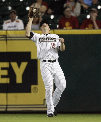 HOUSTON - AUGUST 31:  Right fielder Brian Bogusevic #19 of the Houston Astros makes a catch against the Pittsburgh Pirates at Minute Maid Park on August 31, 2011 in Houston, Texas.  <br /><br /><span class="help">(Photo by Bob Levey/Getty Images)</span>