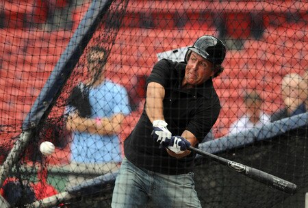 BOSTON, MA - SEPTEMBER 1: Golfer Phil Mickelson takes in some batting practice prior to the Boston Red Sox/New York Yankees game at Fenway Park on September 1, 2011 in Boston, Massachusetts. <br /><br /><span class="help">(Photo by Darren McCollester/Getty Images)</span>