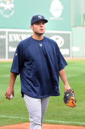 BOSTON, MA - SEPTEMBER 1:  Jesus Montero #63 of the New York Yankees warms up prior to their game against the Boston Red Sox at Fenway Park on September 1, 2011 in Boston, Massachusetts. <br /><br /><span class="help">(Photo by Darren McCollester/Getty Images)</span>
