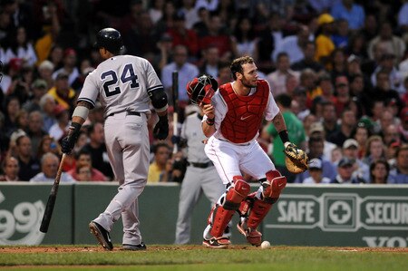 BOSTON, MA - SEPTEMBER 1:  Catcher Jarrod Saltalamacchia #39 of the Boston Red Sox stops a wayward pitch in the first inning as Robinson Cano #24 of the New York Yankees attempts a bat at Fenway Park on September 1, 2011 in Boston, Massachusetts. <br /><br /><span class="help">(Photo by Darren McCollester/Getty Images)</span>