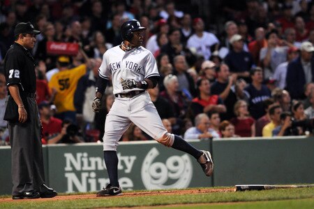 BOSTON, MA - SEPTEMBER 1:  Curtis Granderson  #14 of the New York Yankees scores a run in the first inning against the Boston Red Sox at Fenway Park on September 1, 2011 in Boston, Massachusetts. <br /><br /><span class="help">(Photo by Darren McCollester/Getty Images)</span>