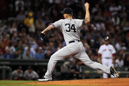 BOSTON, MA - SEPTEMBER 1:  A.J. Burnett  #34 of the New York Yankees throws a pitch in the first inning against the Boston Red Sox at Fenway Park on September 1, 2011 in Boston, Massachusetts. <br /><br /><span class="help">(Photo by Darren McCollester/Getty Images)</span>