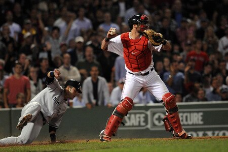BOSTON, MA - SEPTEMBER 1: Catcher Jarrod Saltalamacchia #39 cuts off the throw as Jesus Montero #63 of the New York Yankees scores a run in the seventh inning at Fenway Park on September 1, 2011 in Boston, Massachusetts. <br /><br /><span class="help">(Photo by Darren McCollester/Getty Images)</span>
