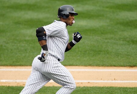 NEW YORK, NY - SEPTEMBER 05:  Robinson Cano #24 of the New York Yankees runs the bases after his second inning grand slam against the Baltimore Orioles on September 5, 2011 at Yankee Stadium in the Bronx borough of New York City.  <br /><br /><span class="help">(Photo by Jim McIsaac/Getty Images)</span>