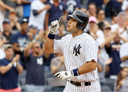 NEW YORK, NY - SEPTEMBER 05:  Jesus Montero #63 of the New York Yankees celebrates his fifth inning home run against the Baltimore Orioles on September 5, 2011 at Yankee Stadium in the Bronx borough of New York City. The home run was the first in the major leagues for Montero.  <br /><br /><span class="help">(Photo by Jim McIsaac/Getty Images)</span>