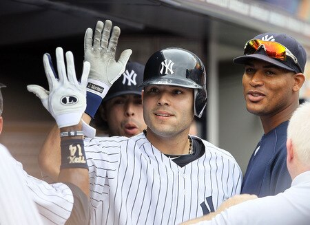 NEW YORK, NY - SEPTEMBER 05:  Jesus Montero #63 of the New York Yankees celebrates his fifth inning home run against the Baltimore Orioles on September 5, 2011 at Yankee Stadium in the Bronx borough of New York City. The home run was the first in the major leagues for Montero.  <br /><br /><span class="help">(Photo by Jim McIsaac/Getty Images)</span>