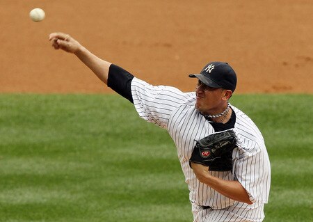 NEW YORK, NY - SEPTEMBER 05:  Freddy Garcia #36 of the New York Yankees pitches against the Baltimore Orioles on September 5, 2011 at Yankee Stadium in the Bronx borough of New York City.  <br /><br /><span class="help">(Photo by Jim McIsaac/Getty Images)</span>