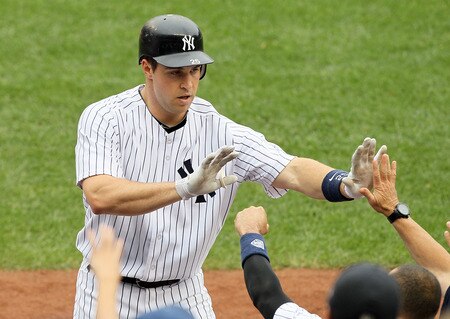 NEW YORK, NY - SEPTEMBER 05:  Mark Teixeira #25 of the New York Yankees celebrates his first inning home run against the Baltimore Orioles on September 5, 2011 at Yankee Stadium in the Bronx borough of New York City.  <br /><br /><span class="help">(Photo by Jim McIsaac/Getty Images)</span>